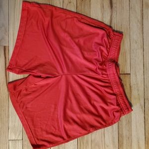 Men's red Tek gear athletic shorts, size M